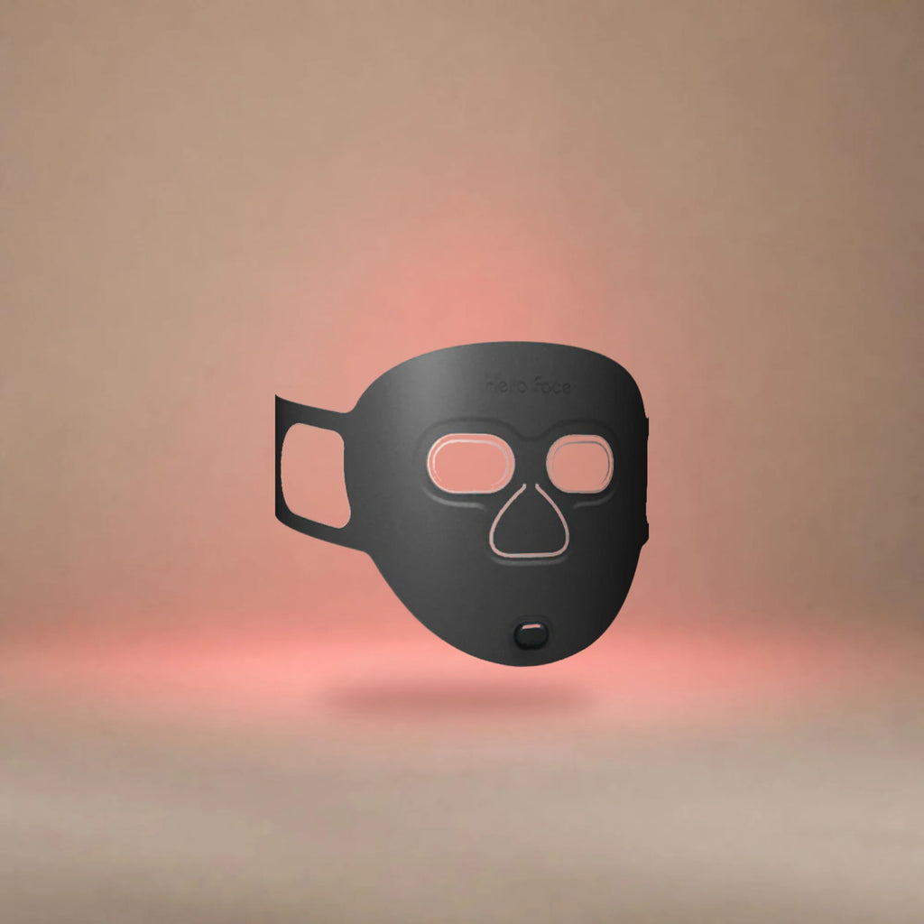 Masque LED visage Hello Face M500S fermé, vu de trois quarts, dans une lumière rouge douce